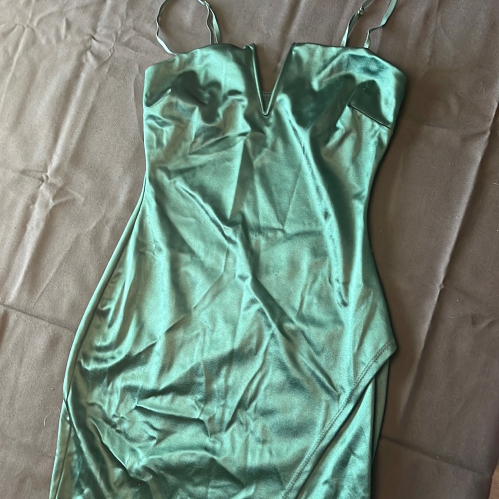 Emerald green tight mini dress with V neck